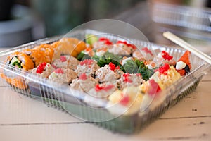 Mix japanese sushi rolls in take away package