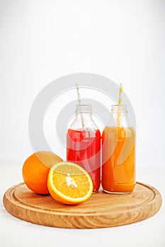 Mix juice. The glass bottle. White background. The concept of be