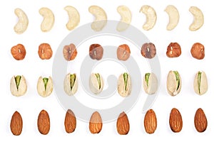 Mix nuts almonds, cashews hazelnuts pistachios isolated on white background. Top view. Flat lay