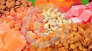 Mix of nuts and dried fruits and sweet turkish delights background