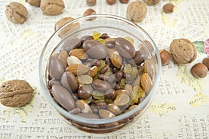 Mix of nuts, raisins,hazelnuts, almonds and chocolate in the bowl