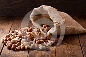 Mix of nuts on wooden table