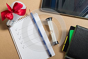 Mix of office supplies and business gadgets on office desk