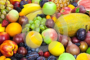 Mix of organic fruits - background