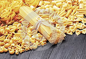 Mix of pasta on wood