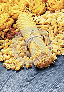 Mix of pasta on wood