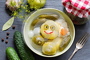 Mix of pickled vegetables on table happy fun food concept