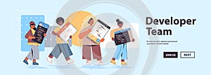 Mix race web developers creating program code development of software and programming concept