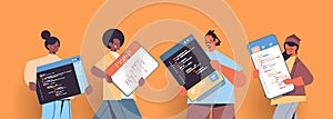 Mix race web developers creating program code development of software and programming concept