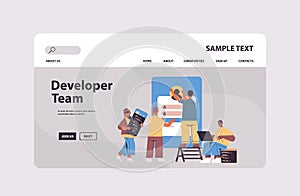Mix race web developers team creating program code application development software programming concept