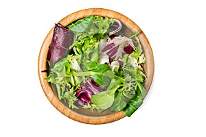 Mix salad leaves in a wooden bowl isolated on white background