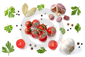 Mix of slice of tomato, basil leaf, garlic and spices isolated on white background. top view