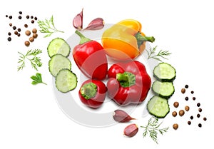 mix of sliced cucumber, garlic, sweet bell pepper and parsley isolated on white background. top view