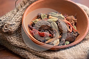 Mix spices and herbs in bowl on dark background, Indian spices food and cuisine ingredients or use for medical