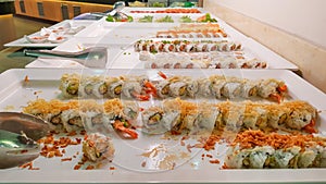 Mix of sushi buffet and rolls, Japanese traditional food, Dishes from raw fish in restaurant