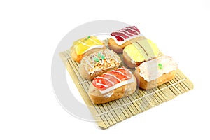 Mix Sushi Donuts in the bamboo dish.