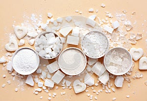Mix of white refined sugar varieties: granulated, cubes, candies, hearts