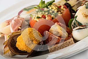 Mixed appetizers with meat, egg and vegetables