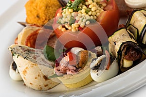 Mixed appetizers with meat, egg and vegetables
