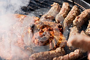 Mixed barbecue on a charcoal grill