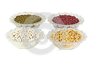 Mixed beans and in the glass bowl on white background. mung bean red kidney bean yellow bean red bean green beanmillet