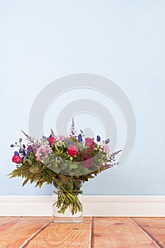 Mixed bouquet flowers on floor