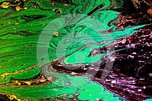 Mixed colorful inks background. Abstract paint texture.