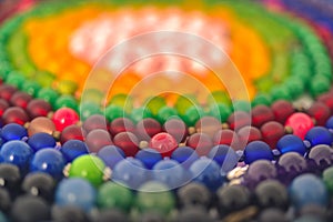 Mixed colors beads close-up made from natural stones or glass marbles