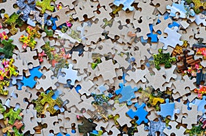 Mixed colour puzzle pieces.
