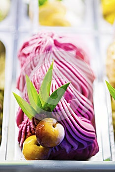 Mixed colourful gourmet ice cream sweet gelato in shop display