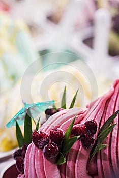 Mixed colourful gourmet ice cream sweet gelato in shop display