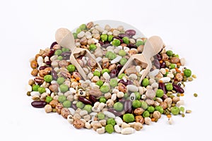 Mixed dried legumes and cereals isolated on white background, top view
