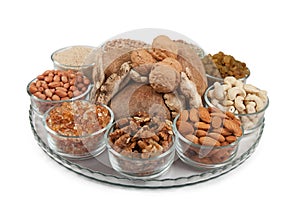 Mixed dry fruits in glass bowl photo