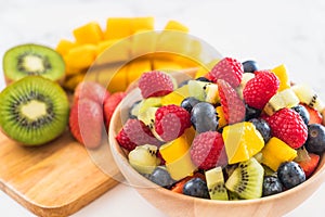 mixed fresh fruits (strawberry, raspberry, blueberry, kiwi, mango)