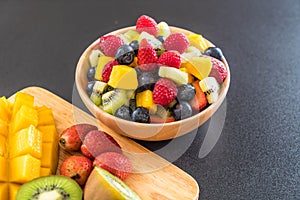 mixed fresh fruits (strawberry, raspberry, blueberry, kiwi, mango)