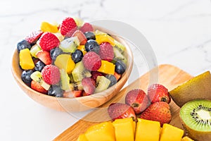 mixed fresh fruits (strawberry, raspberry, blueberry, kiwi, mango)