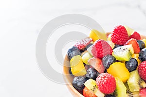 mixed fresh fruits (strawberry, raspberry, blueberry, kiwi, mango)