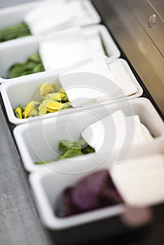 Mixed fresh herbs in kitchen interior