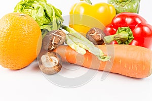 Mixed Fresh Vegetables and fruit on white