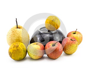 Mixed fruit with black bowl still life on white background