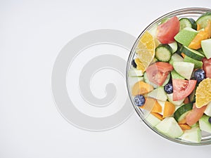 Mixed fruit and vegetable salad in a glass bowl