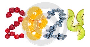 Mixed fruits. New year 2024 made of fruits on the white background