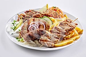 Mixed grill Greek plate with souvlaki and skewers