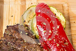 Mixed grilled meats platter closeup