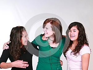 Mixed group of laughing teen girls