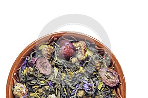 mixed herbs and fruit tea in bowl