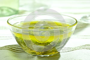 Mixed herbs in olive oil photo