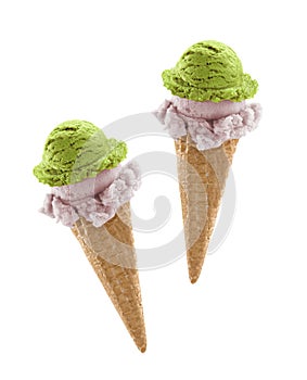 Mixed ice cream scoops with cone on white