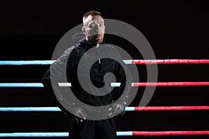 Mixed martial artist posing in boxing ring. Concept of mma, ufc, thai boxing, classic boxing