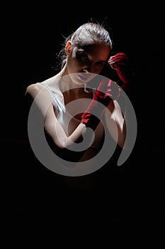 A mixed martial arts fighter. Extreme strength sport for women. MMA sports discipline